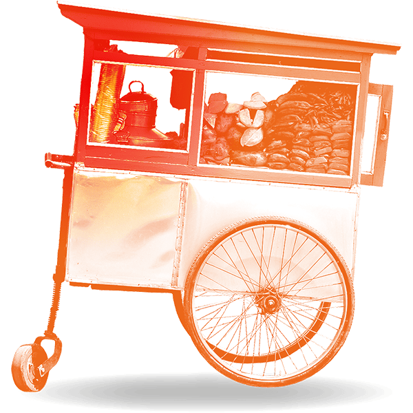 Carro de comida callejera en Le&oacute;n, M&eacute;xico, con productos tradicionales y ambiente vibrante.