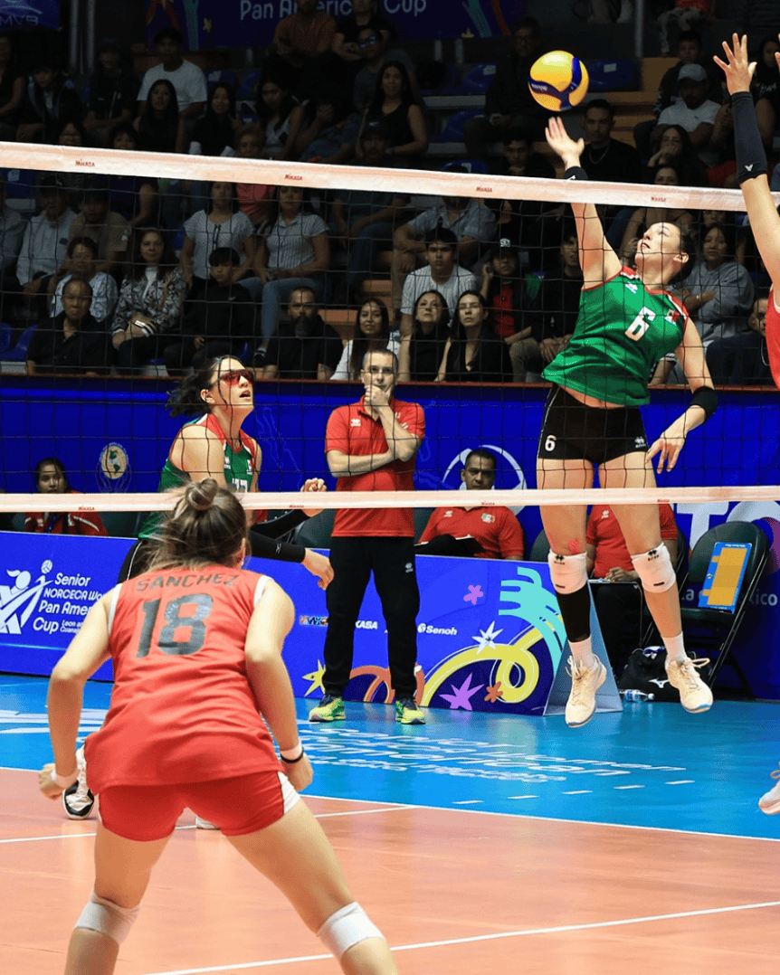 Volleyball players in action during a match in León, Guanajuato, Mexico, at the Pan American Women's Volleyball Cup.